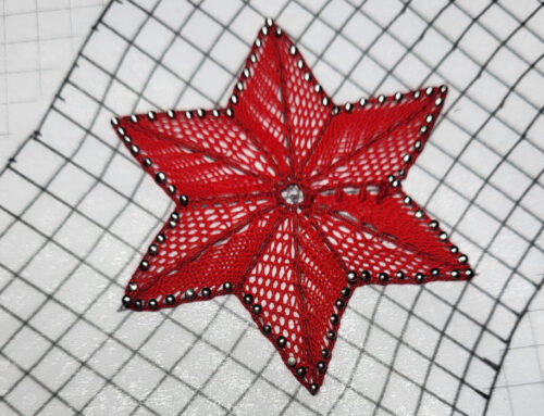 Das Wappen von Erbach im Odenwald in Klöppelspitze